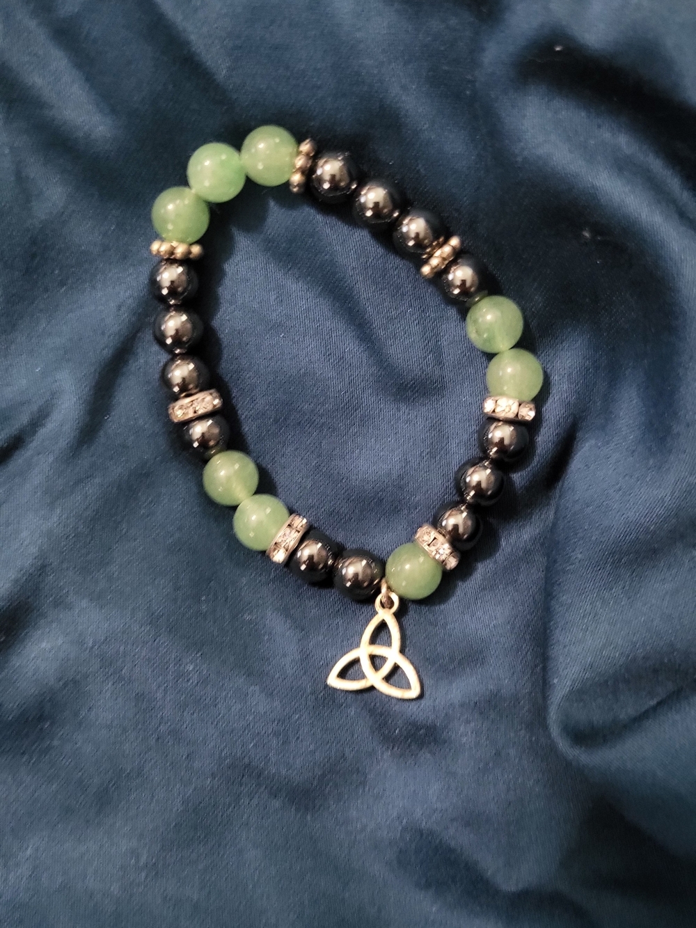 Green and Black Beaded Charm Bracelet with Celtic Knot